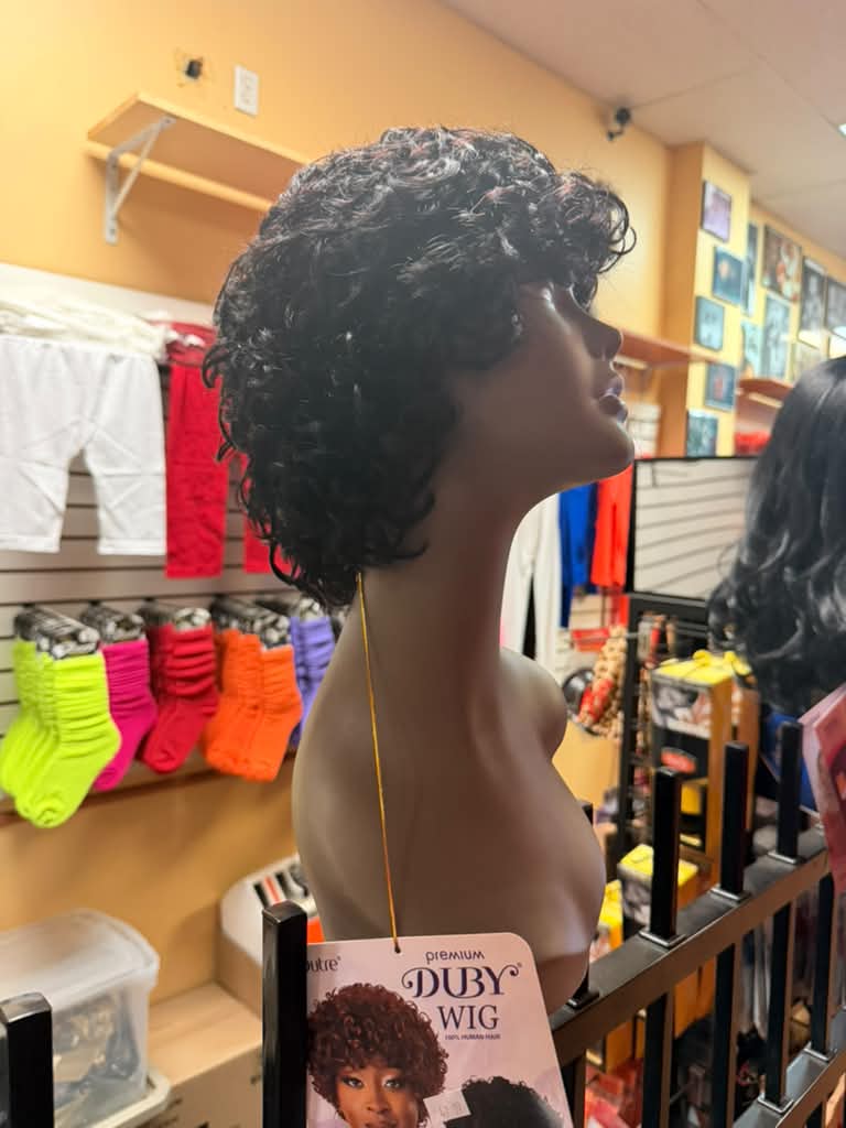 Side view of the Outre Premium Duby 100% human hair short curly wig at Beyond Image Suites and Supplies