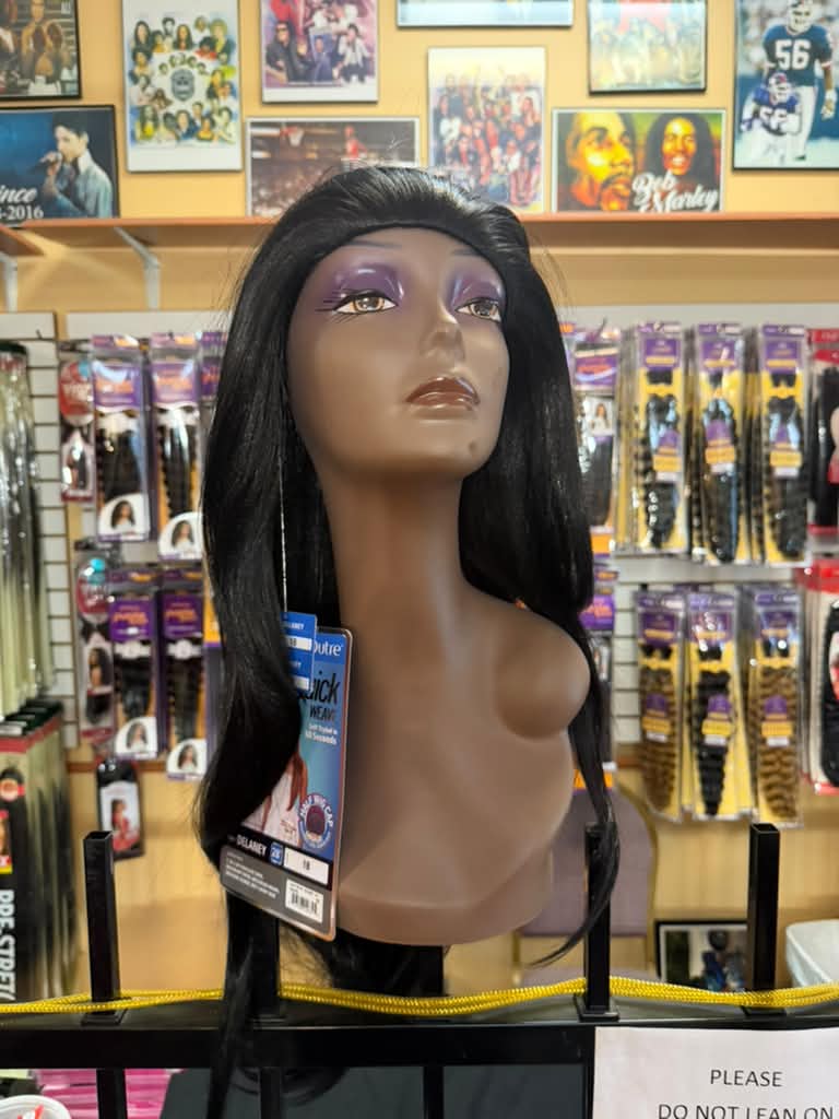 Outre Quick Weave Delaney long straight black wig with half wig cap on a mannequin at Beyond Image Suites and Supplies